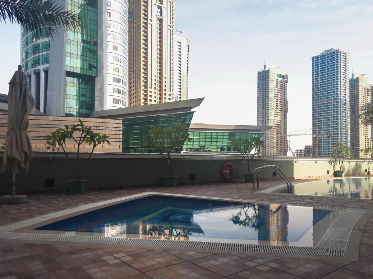 Higuests - Cozy Studio With Panoramic Views On The Lake Lägenhet Dubai Exteriör bild
